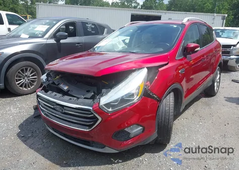 2017 Ford Escape Titanium z USA, uszkodzony, nr VIN 1FMCU0J96HUE29464